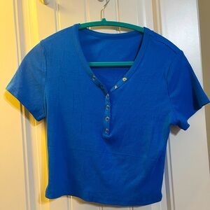 Blue crop top with buttons. Size medium